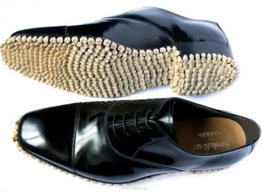 Just in time for Halloween, shoes made from human dentures 2 fantich and young teeth predator shoes 1