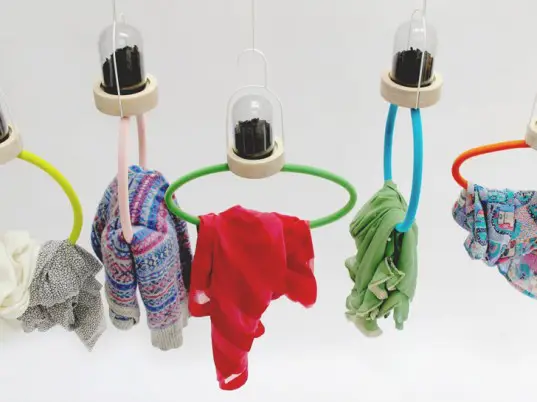 Clothes hangars use activated charcoal to keep your frocks fresh and clean 2 lisa-bengtsson-bye-bye-laundry-charcoal-hangers-1