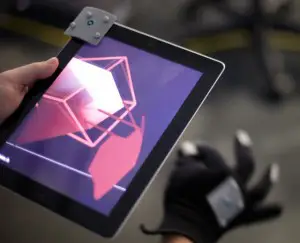 tether-augmented-reality-glove-3 T(ether) augmented reality glove lets you manipulate virtual objects in mid-air 4