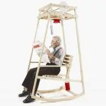 Rocking-knit rocking chair automatically knits as you sway back and forth 5 Rocking-knit rocking chair automatically knits as you sway back and forth 4