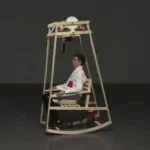 Rocking-knit rocking chair automatically knits as you sway back and forth 3 Rocking-knit rocking chair automatically knits as you sway back and forth 2